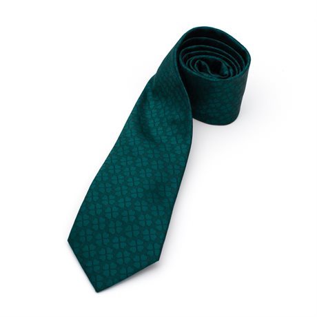 Slips med invävda klöver